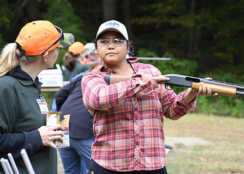 An instructor speaks with a BOW Program participant.